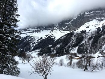 Scenic view of mountains against sky during winter