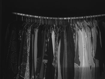 Close-up of clothes hanging on rack