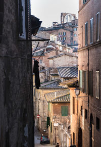 Buildings in city against sky