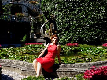 Rear view of woman standing in park