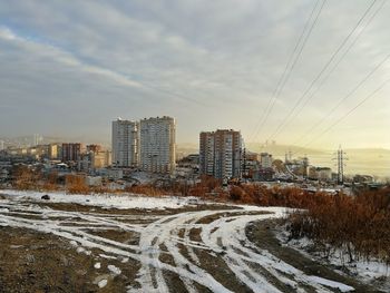 Aerial view of city buildings during winter