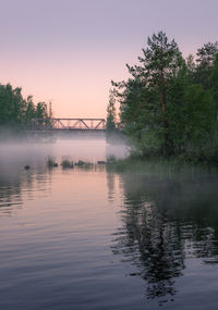 View of bridge over lake against sky