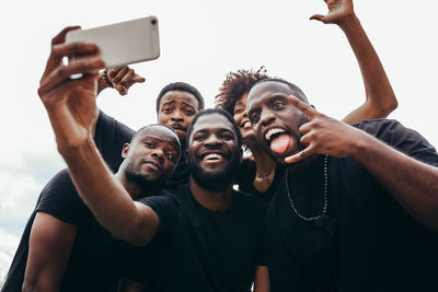 Group of black race friends taking a selfie