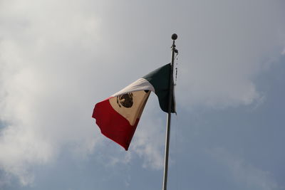 Low angle view of flag against sky