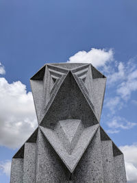 Low angle view of sculpture against sky