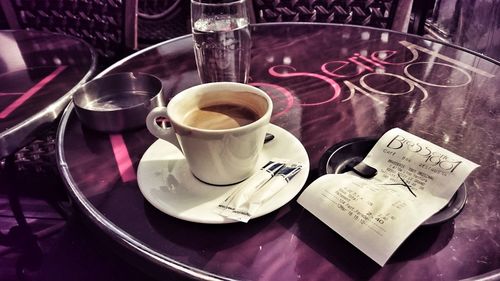 Close-up of coffee cup on table