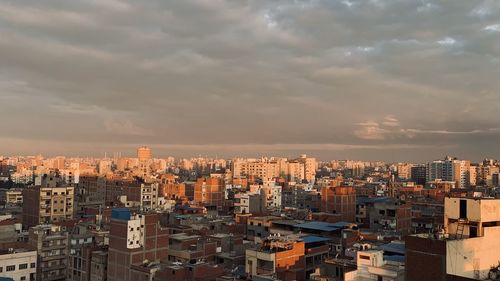 High angle view of buildings against sky in city