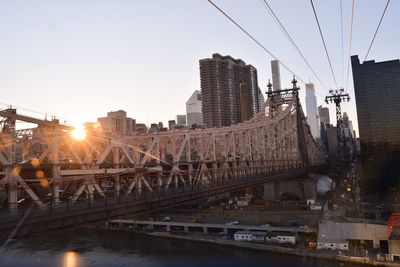 Queensboro bridge against sky during sunset