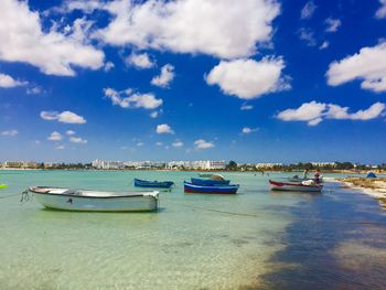 Boats moored in sea