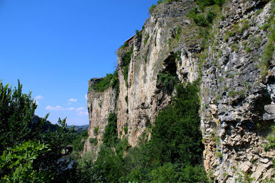 Low angle view of mountain against clear sky