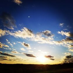 Scenic view of silhouette landscape against sky during sunset