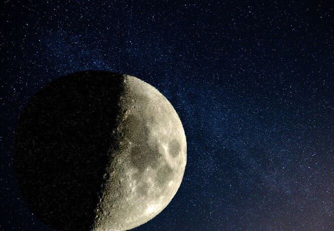 LOW ANGLE VIEW OF MOON AT NIGHT SKY