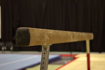 Close-up of balance beam in gym