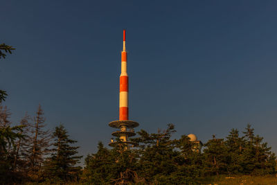 Low angle view of tower against clear blue sky