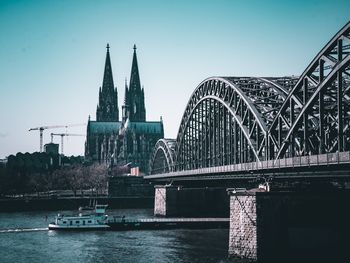 Bridge over river against sky