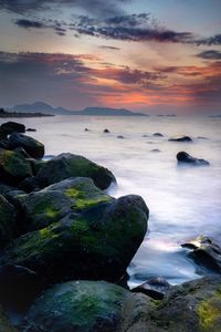 Scenic view of sea against sky during sunset