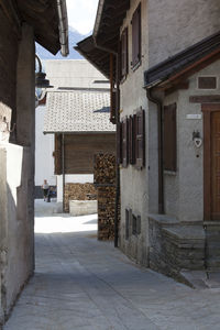 Footpath amidst buildings in town