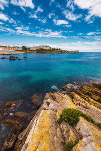 Scenic view of bay against sky