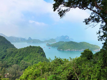 Scenic view of sea and mountains against sky at mu ko ang thong national park
