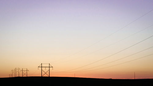 Low angle view of electricity pylon