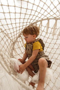 Children swinging on a swing