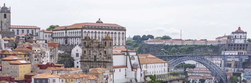 Buildings in city against sky