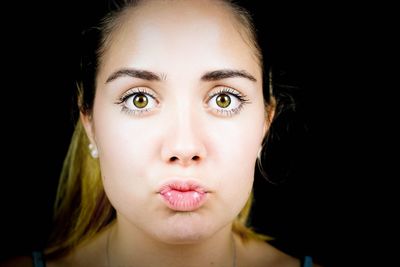 Portrait of young woman making a silly face 