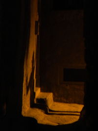 Close-up of illuminated text on wall