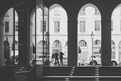 People in front of building