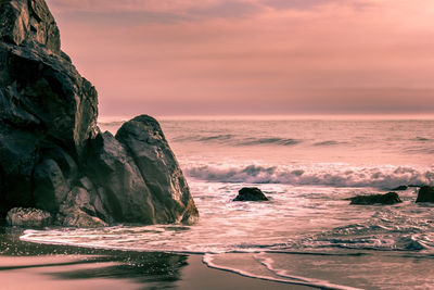 Scenic view of sea against sky during sunset