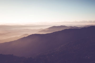 Scenic view of mountains against sky during sunset