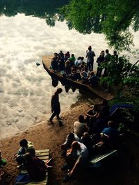 High angle view of man sitting in water