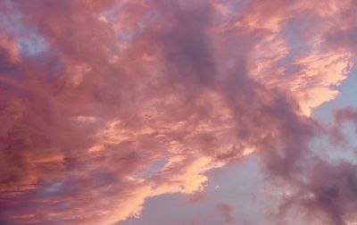 Low angle view of dramatic sky during sunset