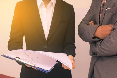 Close-up of people working