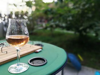 Close-up of wine in glass on table