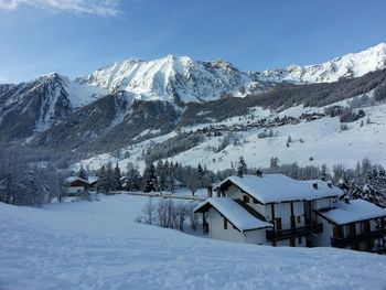 Scenic view of snow covered mountains