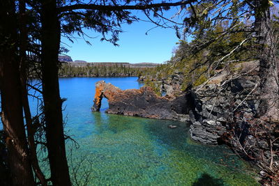 Scenic view of lake against rock formation