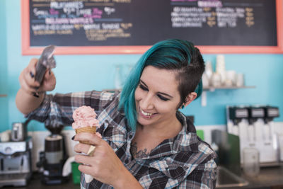 Young woman at ice cream shop.