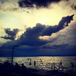 Scenic view of sea against cloudy sky