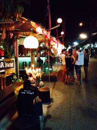 People at market stall