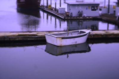 Boat moored in river