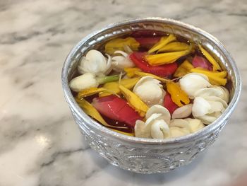High angle view of fruits in bowl on table