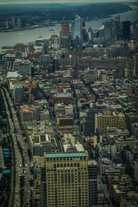 High angle view of buildings in city against sky