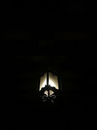 Close-up of illuminated electric lamp