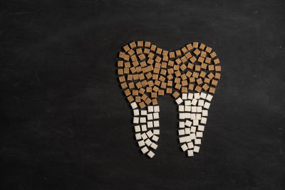 High angle view of heart shape made from wood