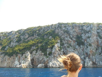 Woman standing on rocks