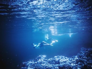 Person swimming in sea