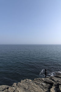 Scenic view of sea against clear sky