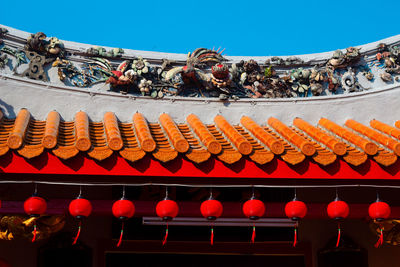 Low angle view of lanterns hanging at market stall