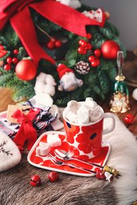 Close-up of christmas decorations on table